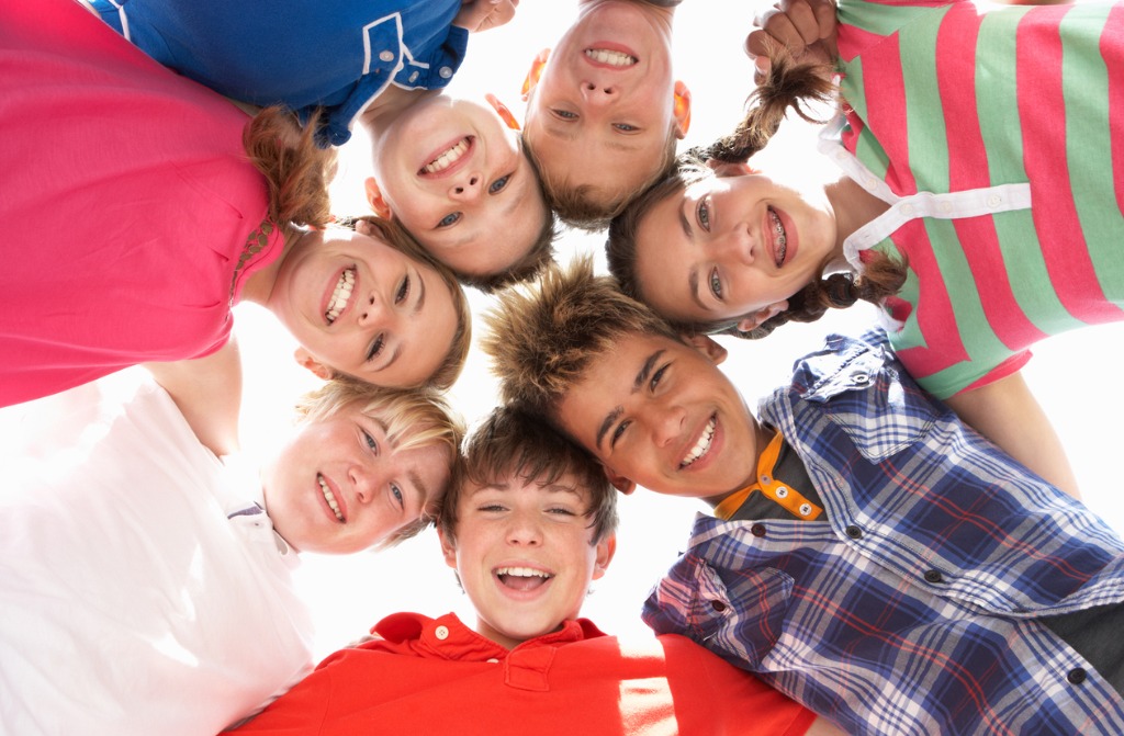 low-angle-view-of-teenagers-in-circle-picture-id123905412.jpg